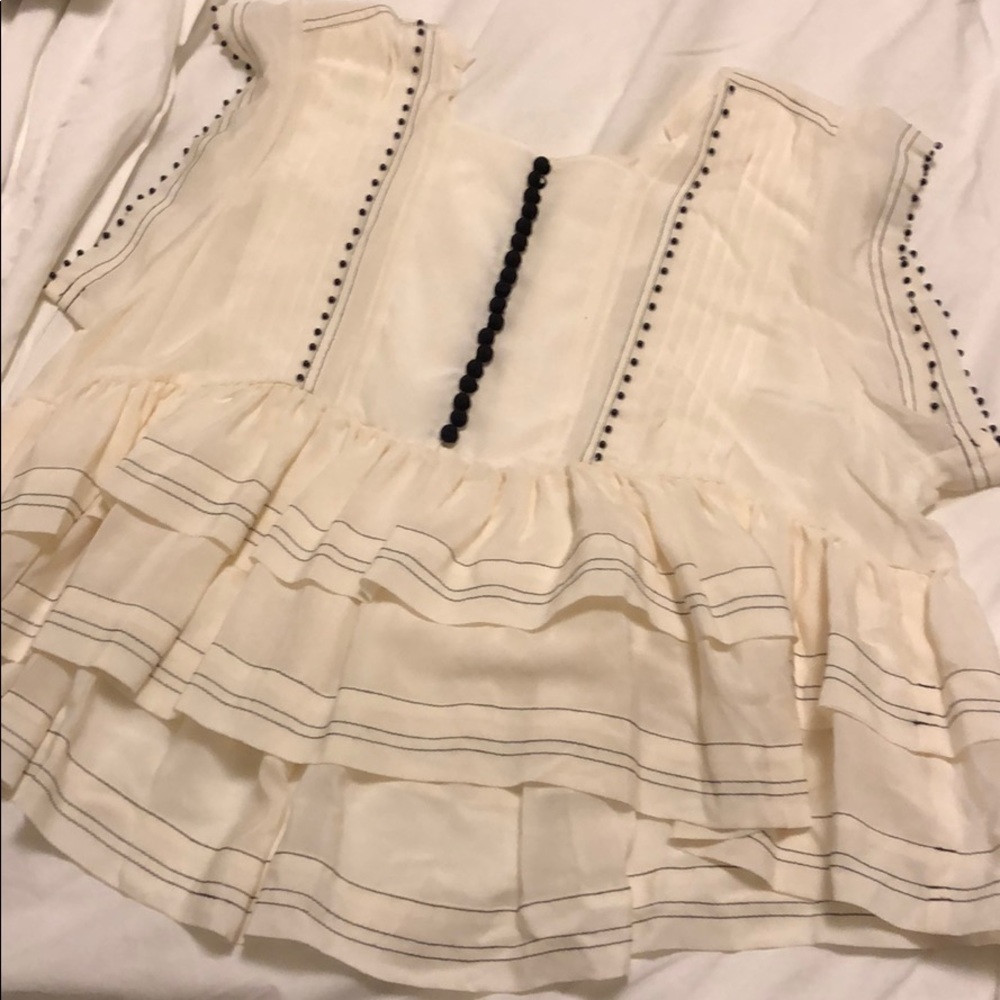 Silk peplum ruffle top